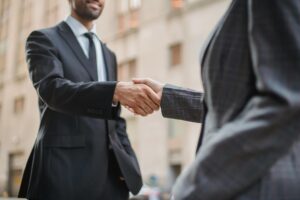 two men shaking hands