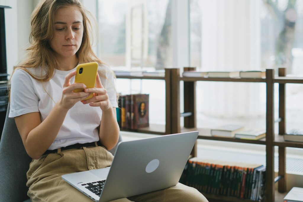 A woman looking at her phone
